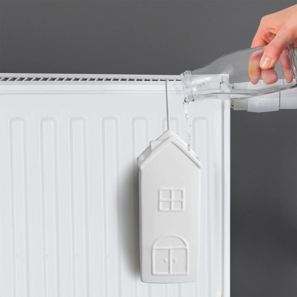 Ceramic Humidifier with House Motif for Dry Winter Days