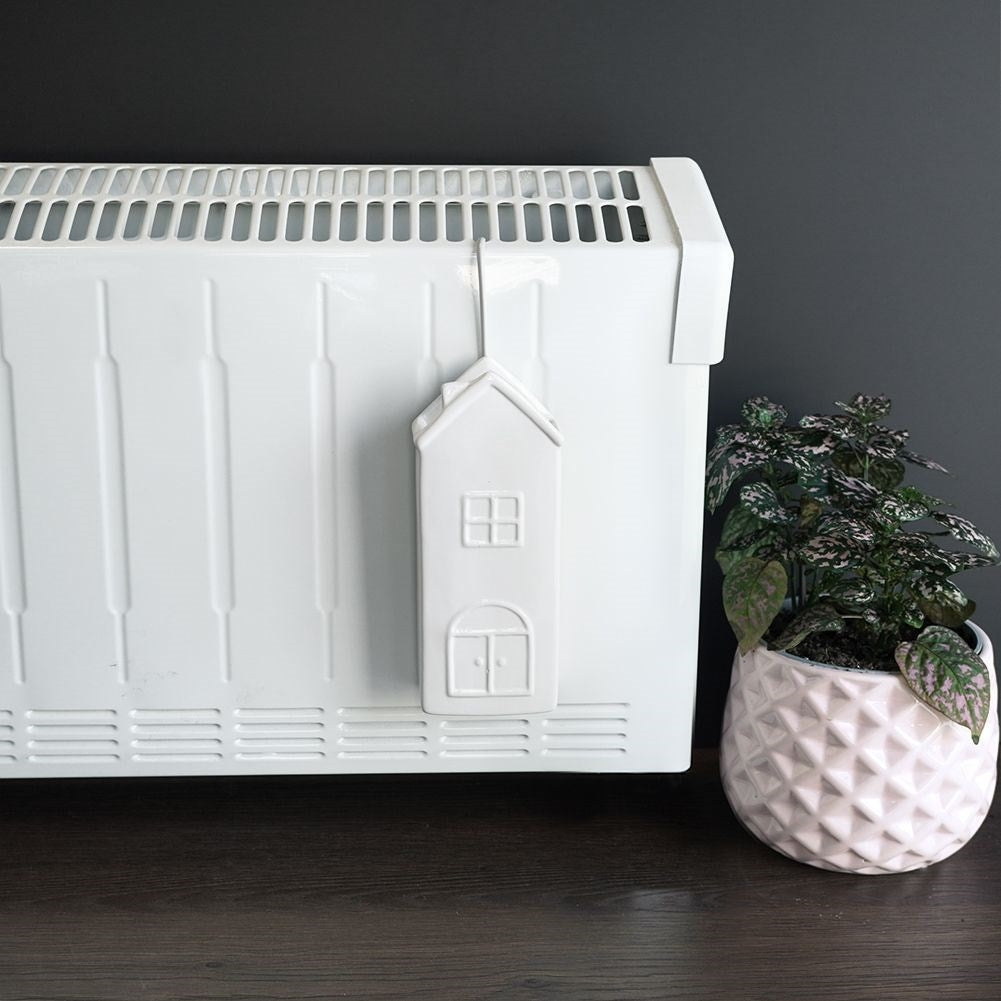 Ceramic Humidifier with House Motif for Dry Winter Days