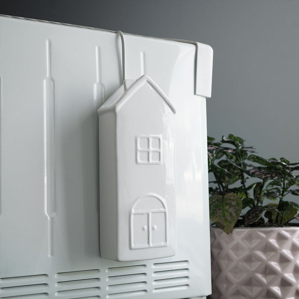 Ceramic Humidifier with House Motif for Dry Winter Days