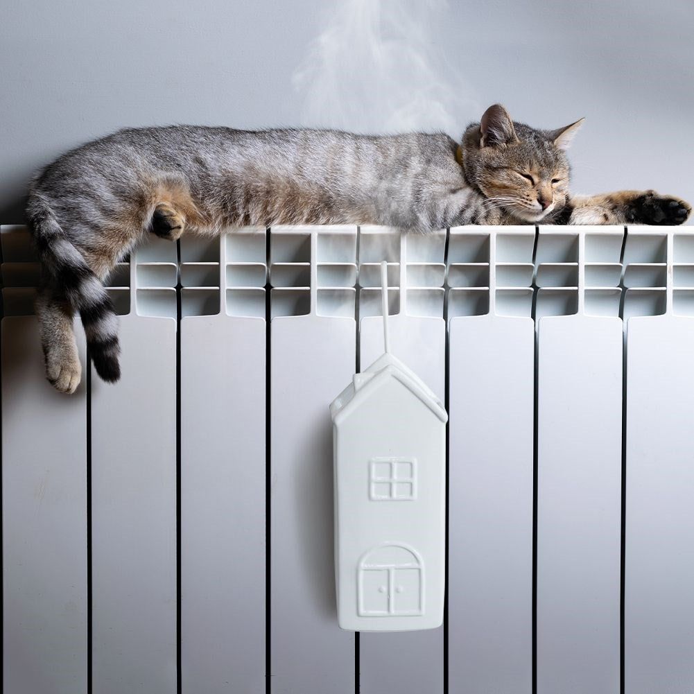 Ceramic Humidifier with House Motif for Dry Winter Days