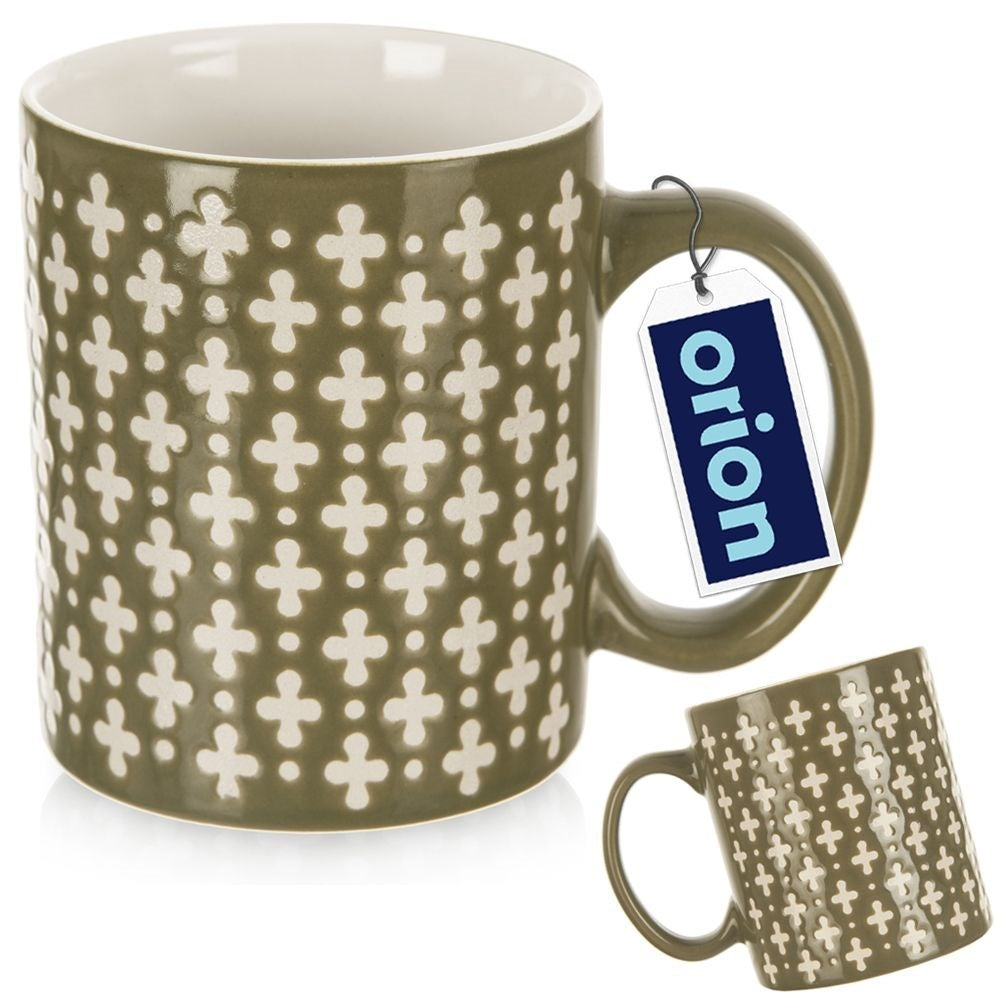 Ceramic cup for coffee and tea, green with cream decoration