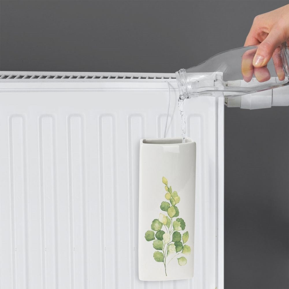 Ceramic humidifier with leaf motif for dry winter days