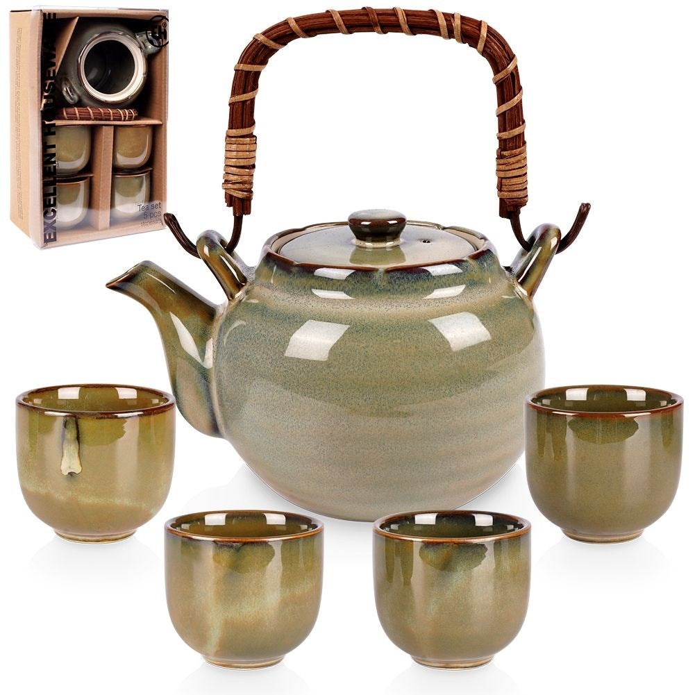 Ceramic teapot with four bowl-shaped cups