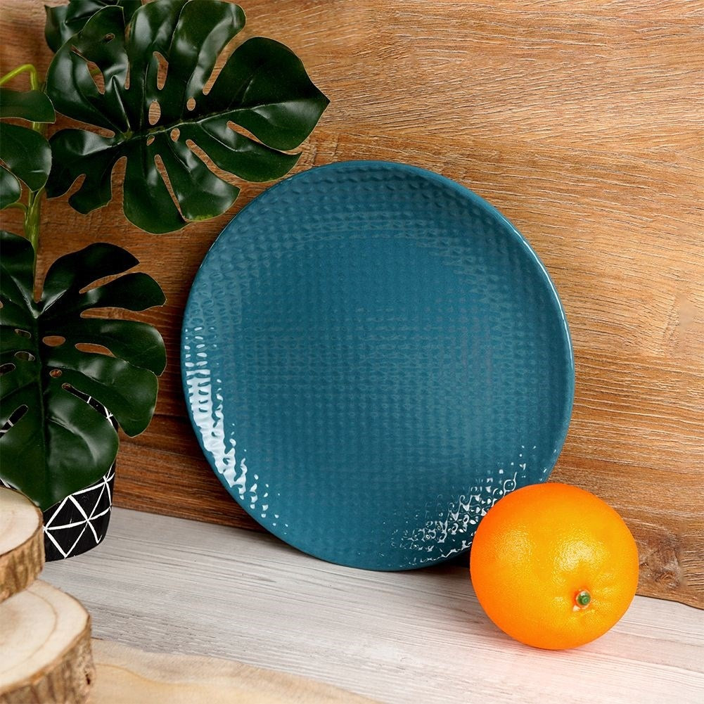Ceramic vessels with modern relief design in trendy colors