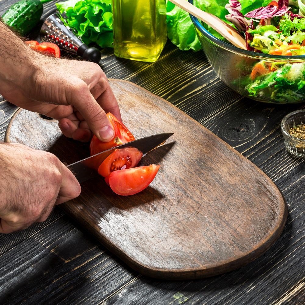 Chef's knife: Stainless steel, non-slip grip, versatile.