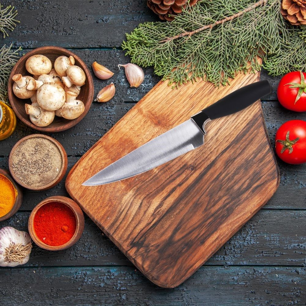 Chef's knife: Stainless steel, non-slip grip, versatile.