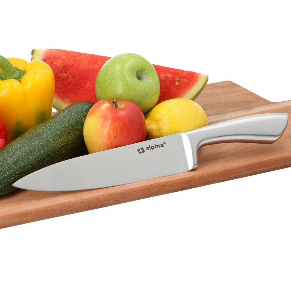 Chef's knife in stainless steel with serrated blade