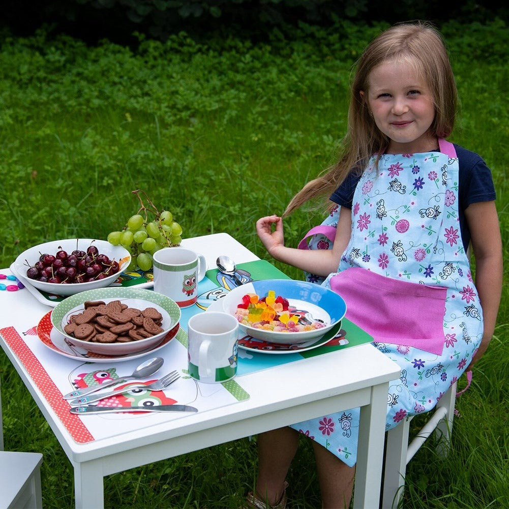 Child-friendly kitchen mat with colorful owl motifs