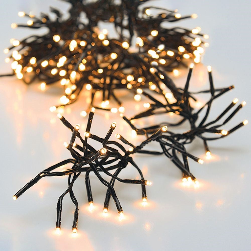 Christmas lighting LED cluster, warm white, 11m, mains power, inside/outside