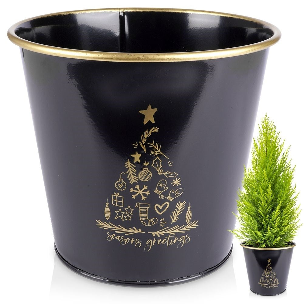Christmas metal pot in gold with white Christmas tree decoration