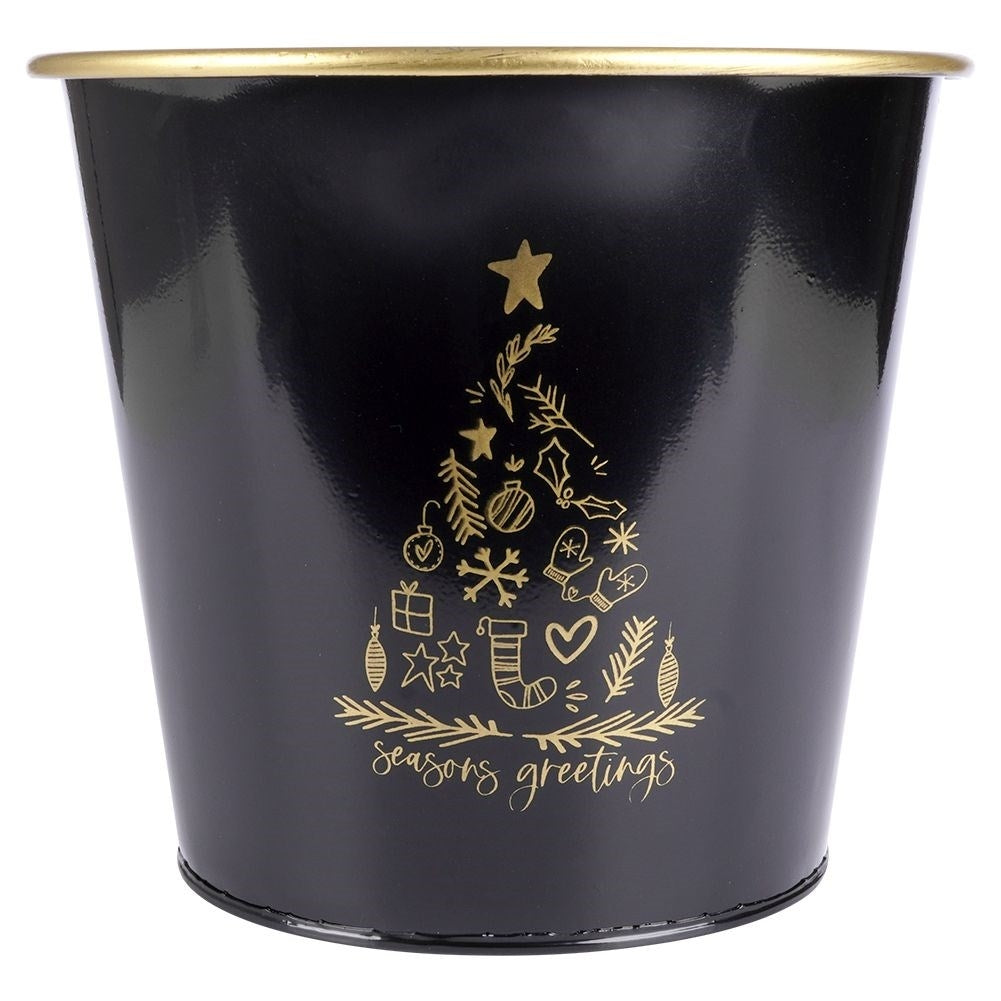 Christmas metal pot in gold with white Christmas tree decoration