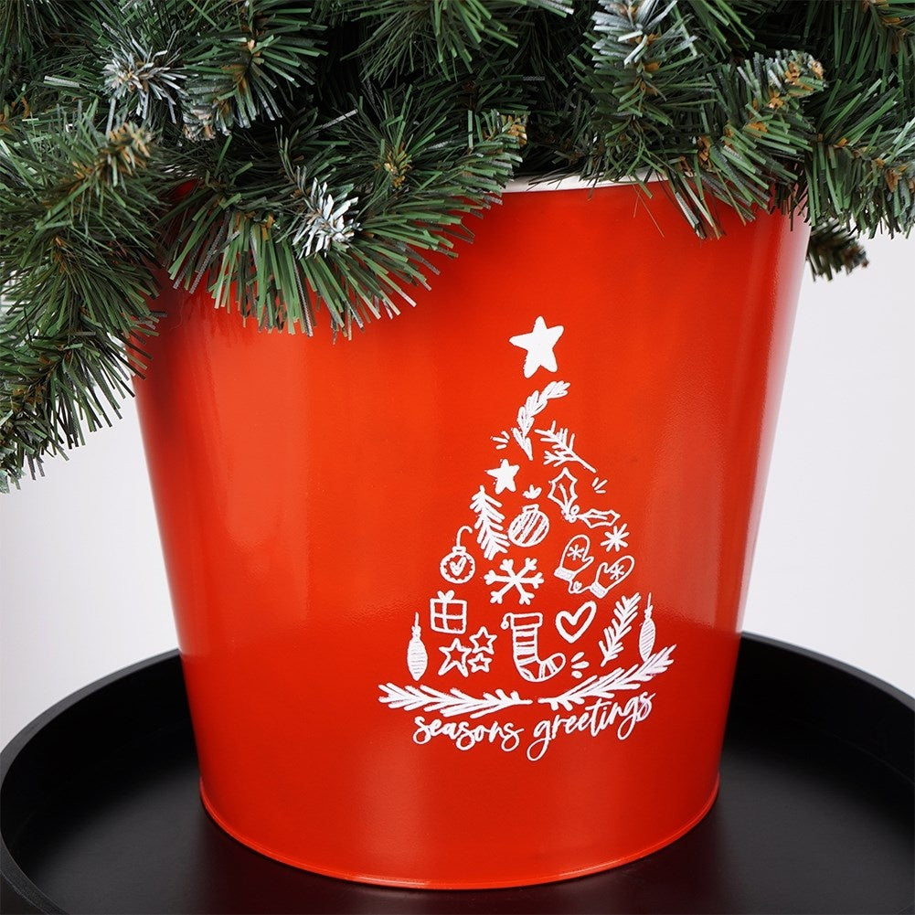 Christmas pot in red metal with white Christmas tree decoration