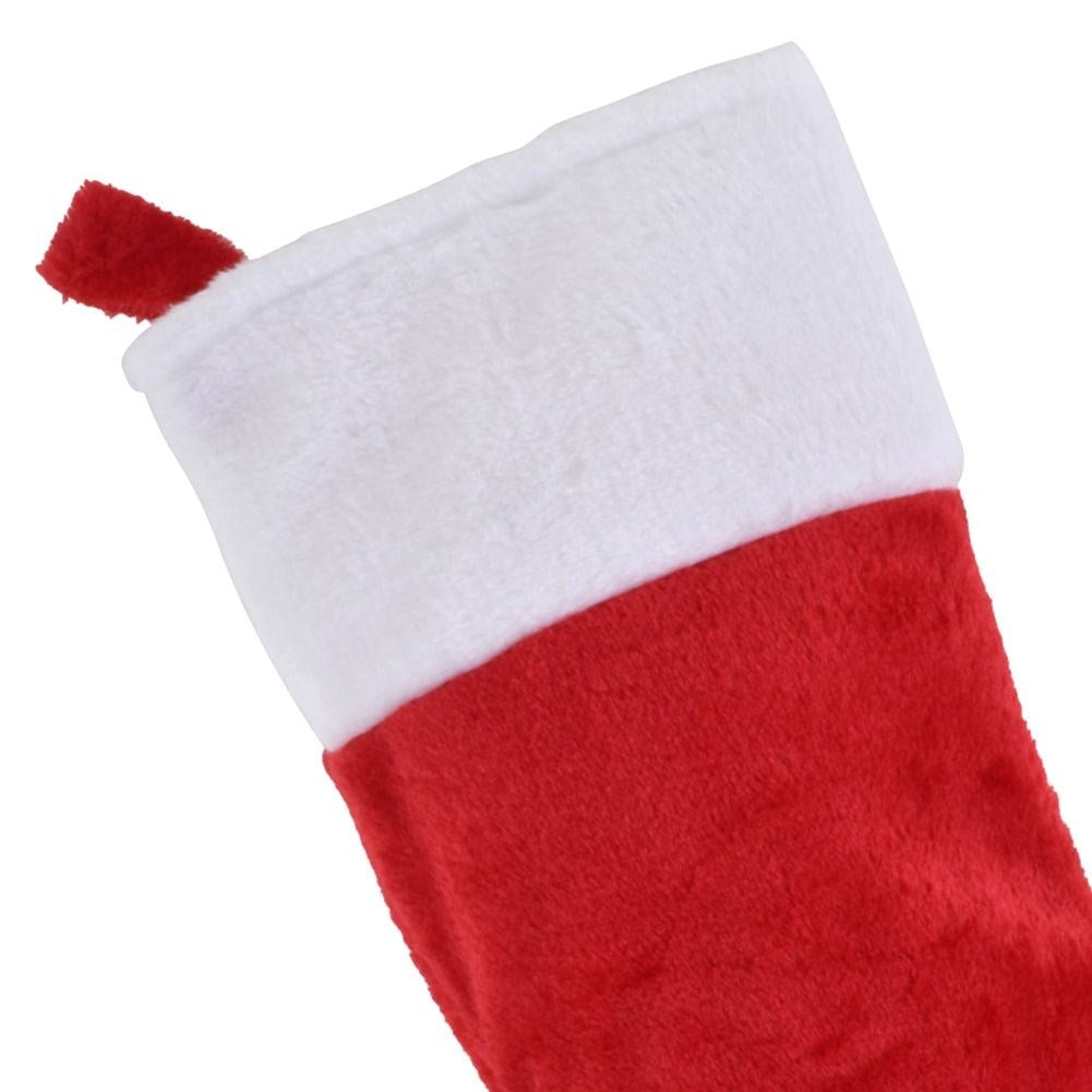 Christmas stocking in red and white plush for Christmas gifts and gifts