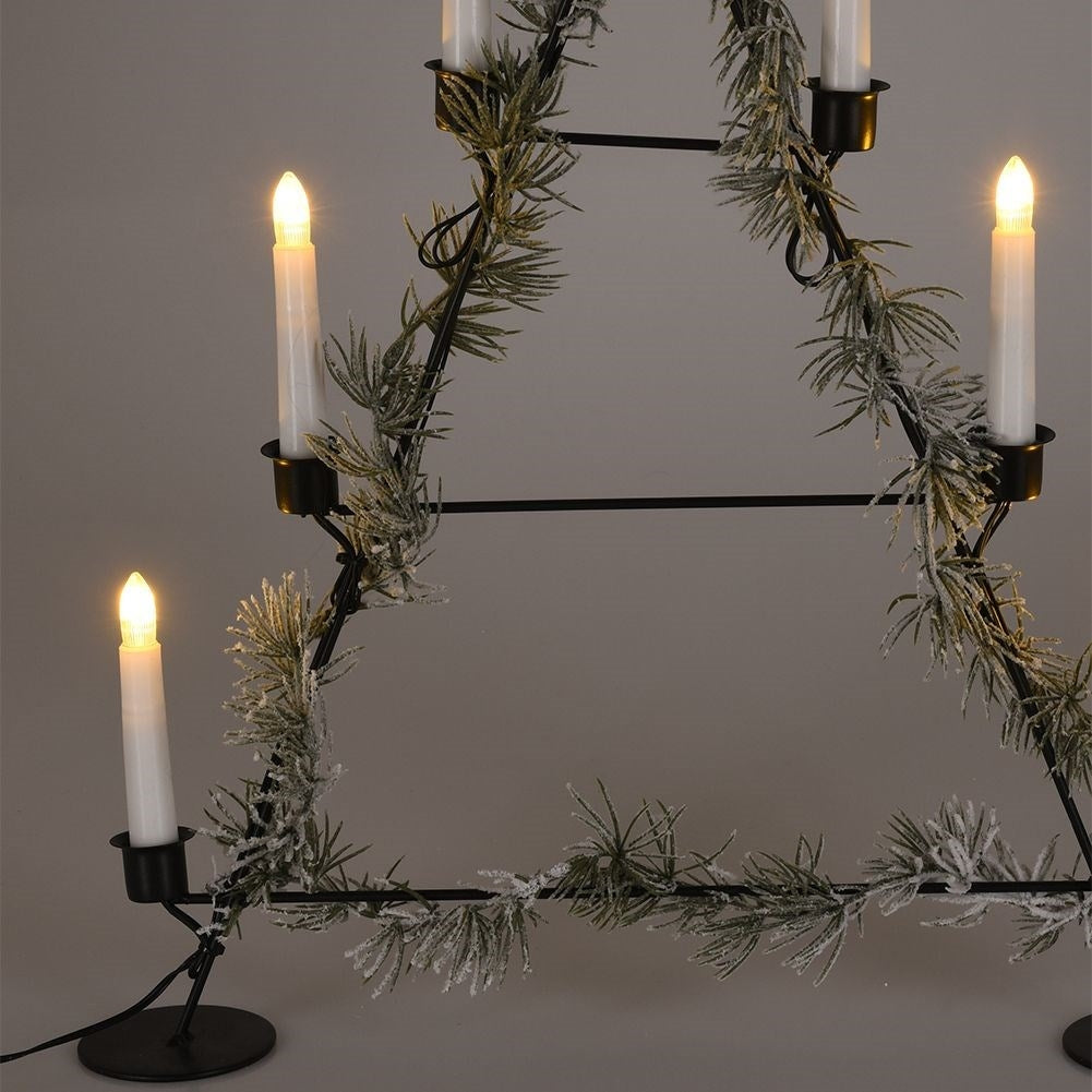 Christmas tree-shaped candle holder with seven candles