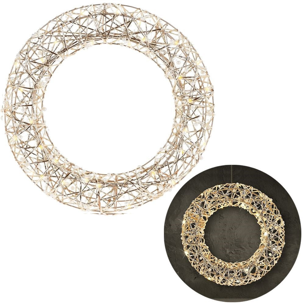 Christmas wreath with LED lights in gold and white pearls