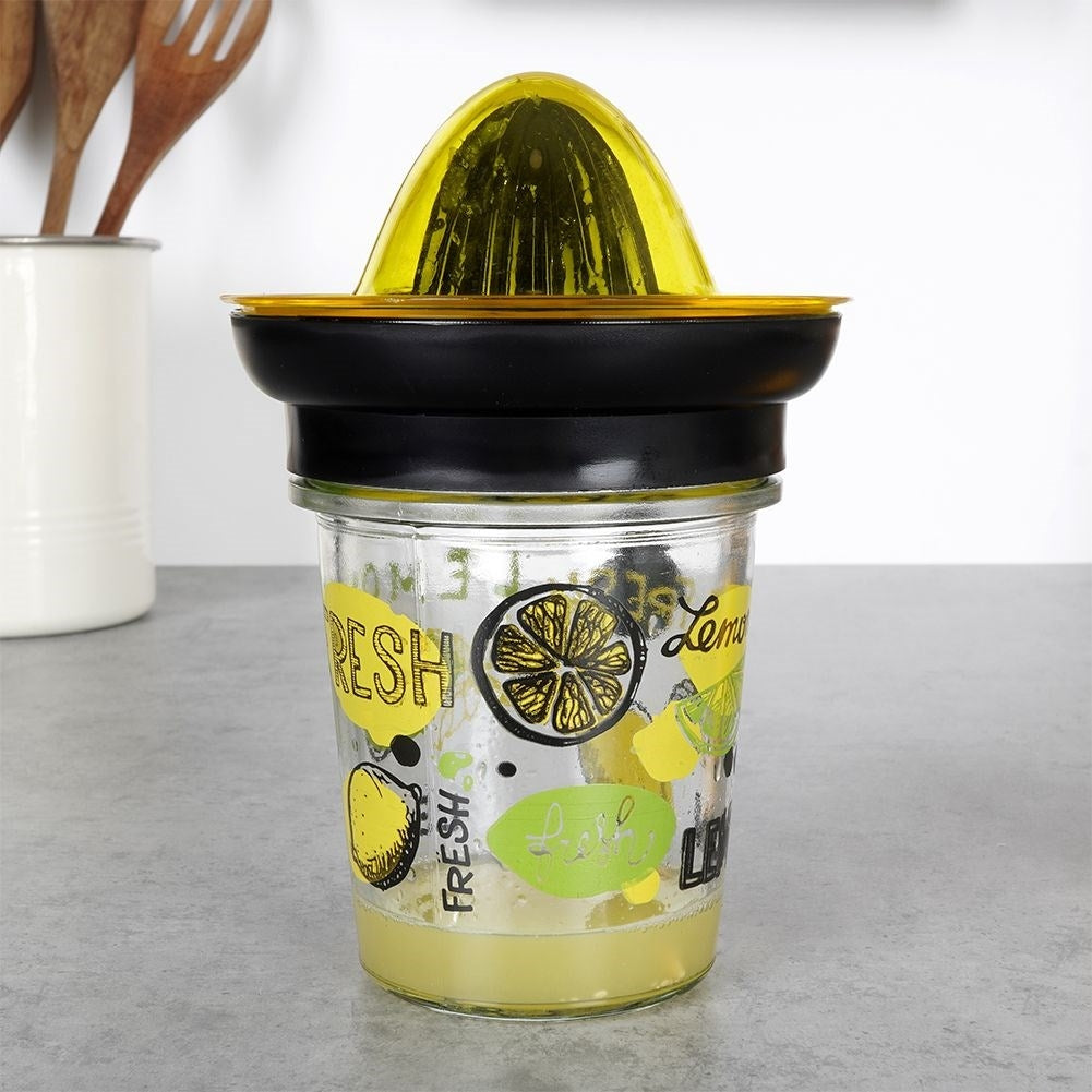 Citrus press with glass container for easy juicing