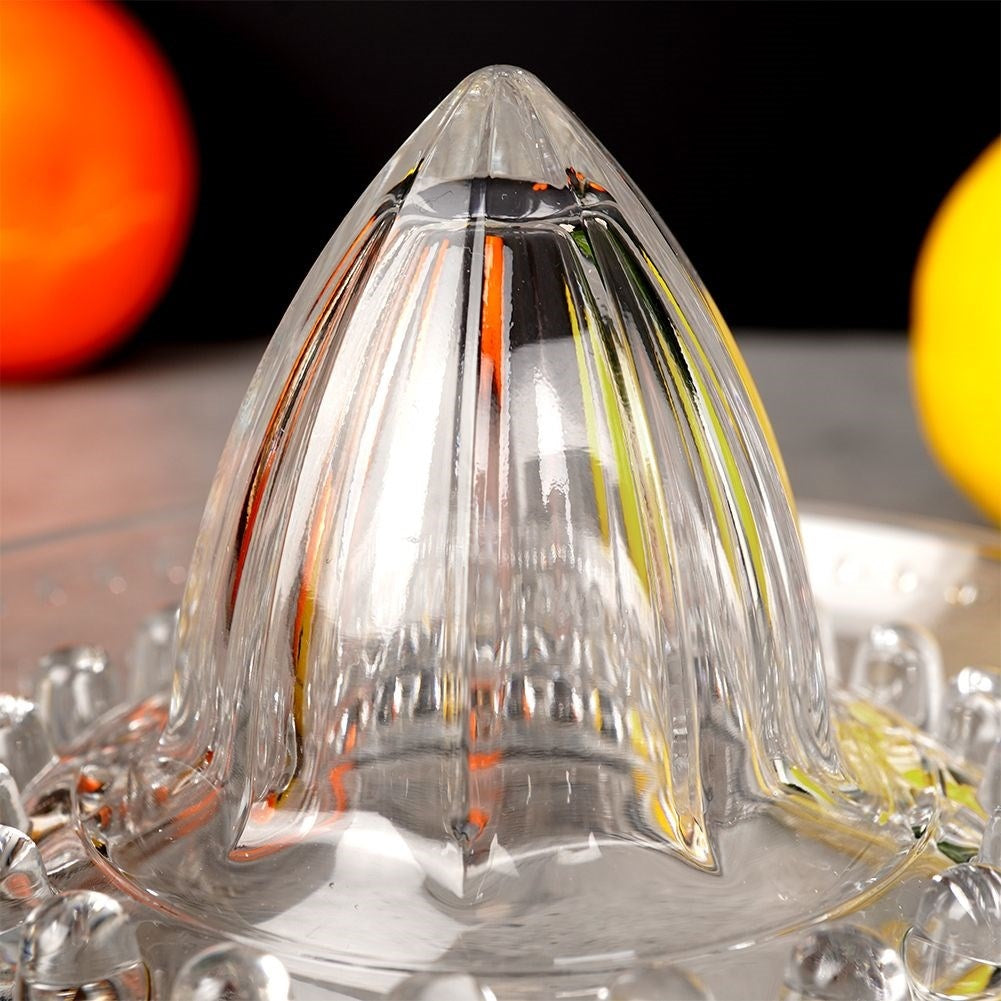 Citrus press with handle and spout