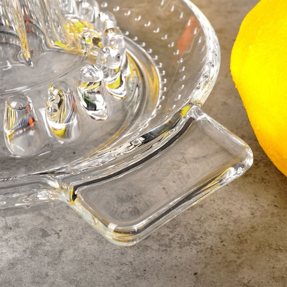 Citrus press with handle and spout