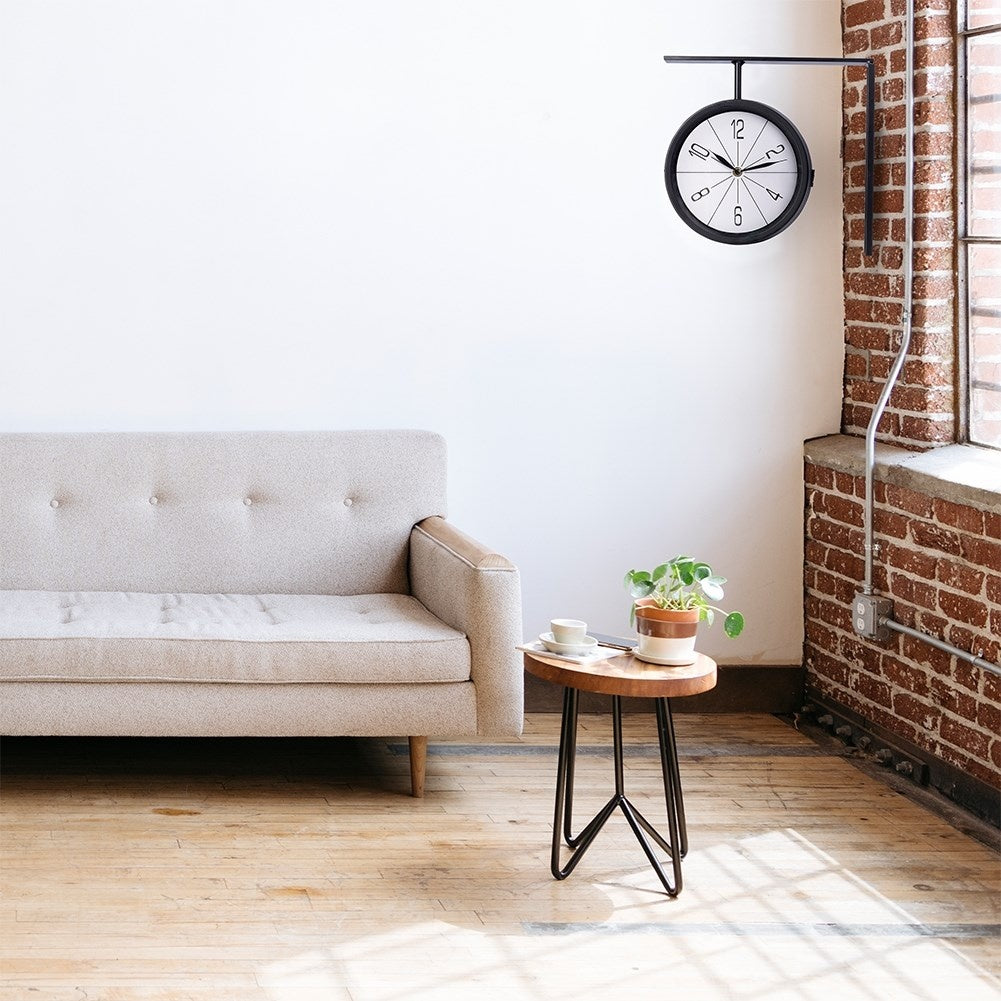 Classic Double Sided ClockThis elegant double-sided watch has a white dial with black hands and numbers. The clock is very easy to read and is perfect for both home and office.