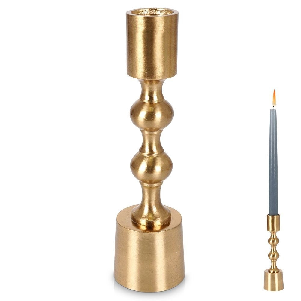 Classic candle holder in gold aluminum for long candles