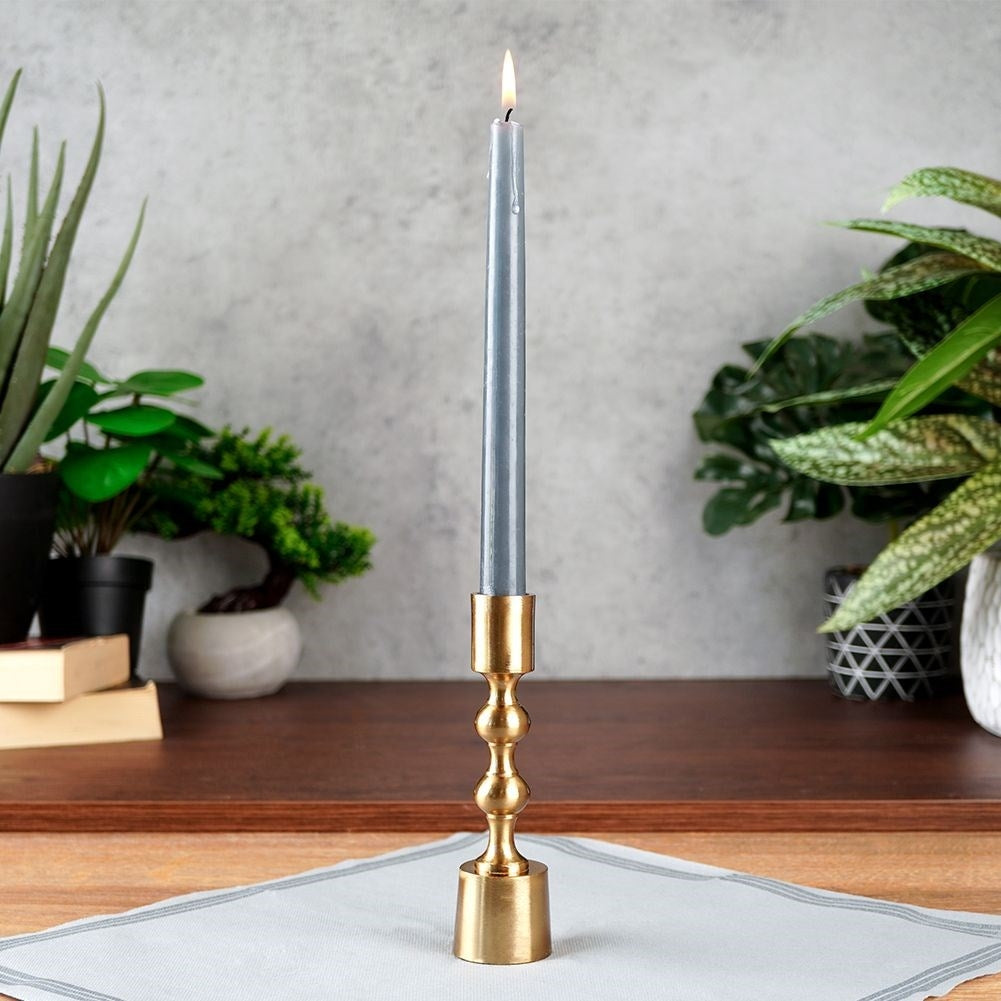 Classic candle holder in gold aluminum for long candles