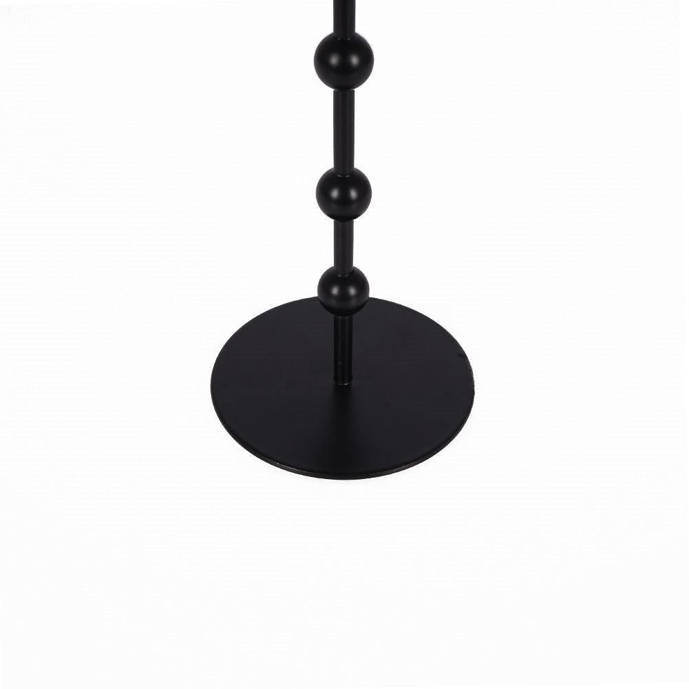 Classic candlestick in black metal for long narrow candles