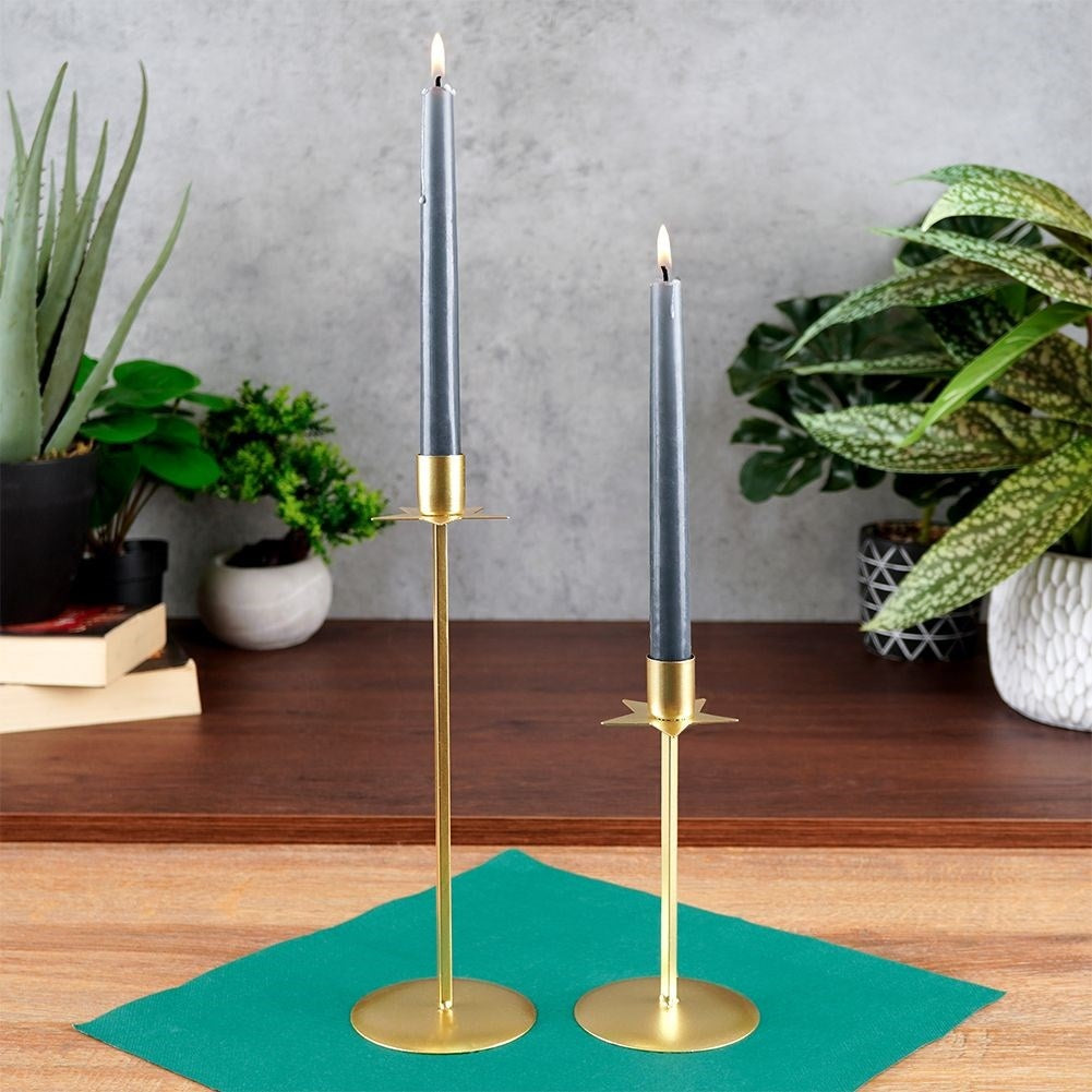 Classic candlestick in gold with decorative star