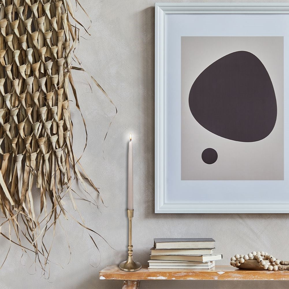Classic elegance: Candlestick for long candles in gold