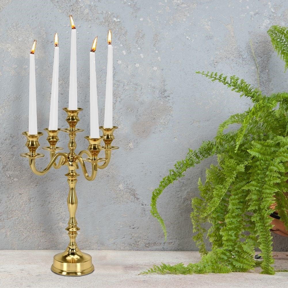 Classic five-arm candlestick in polished gold metal