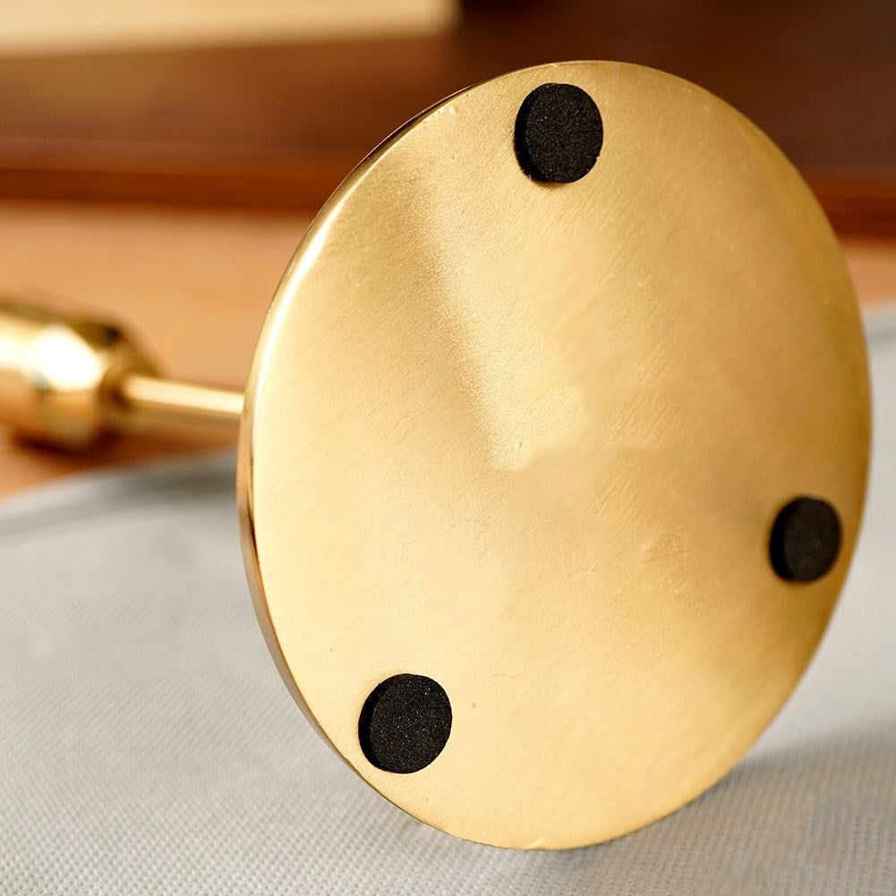 Classic golden candlestick in aluminum for long candles