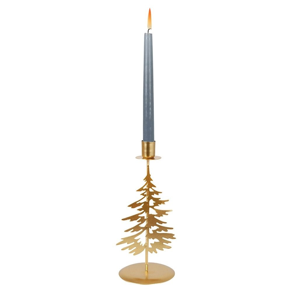Classic golden candlestick with decorative metal fir tree