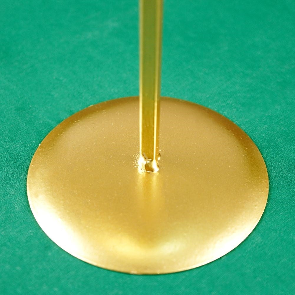 Classic golden candlestick with decorative star