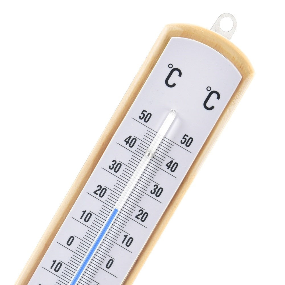 Classic thermometer for indoor and outdoor temperature, wooden material