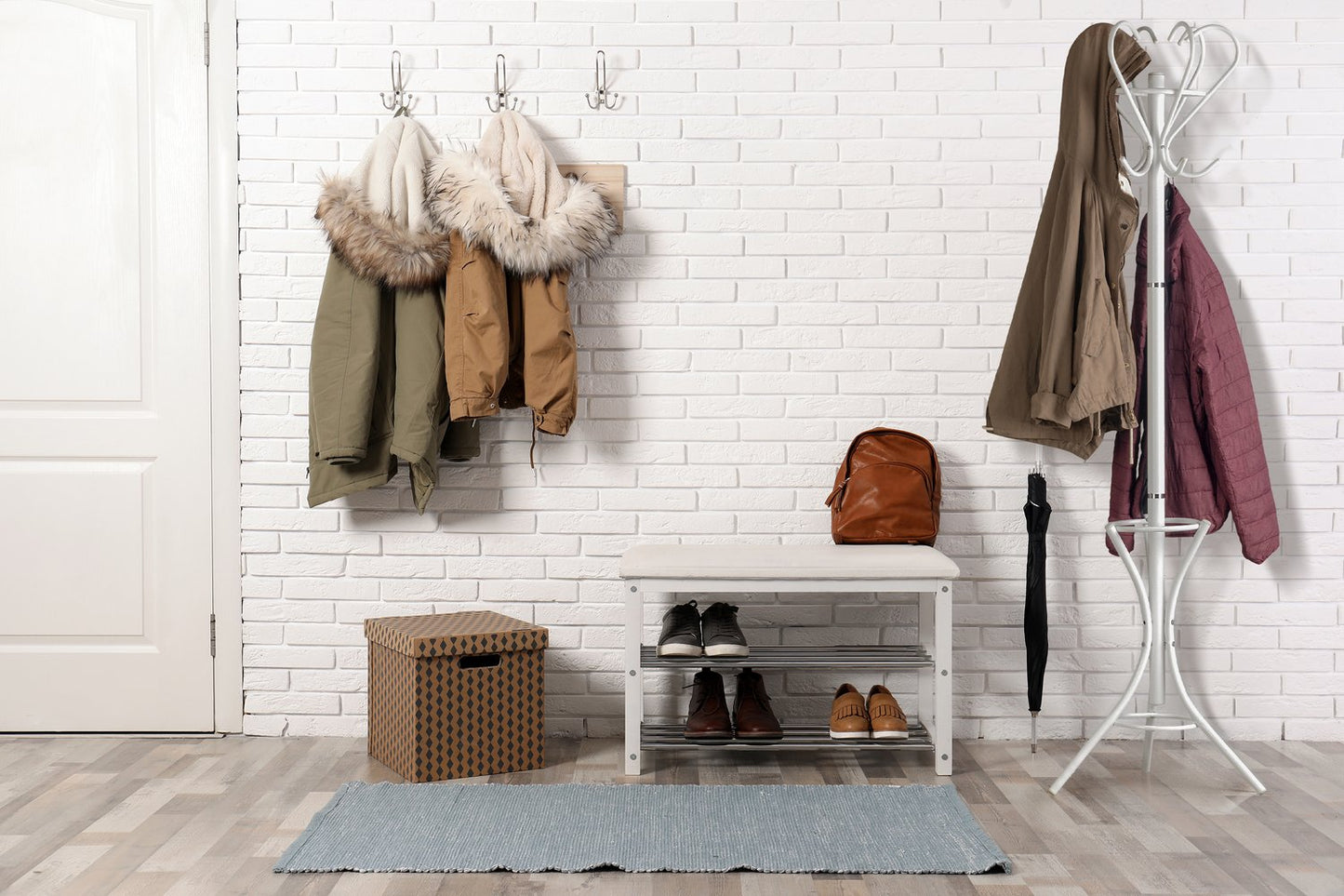 Clothes hanger with black umbrella holder