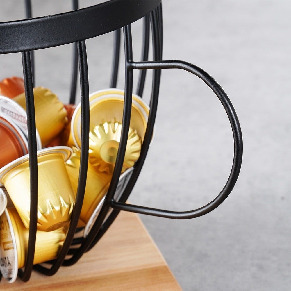 Coffee capsule holder in cup shape with handle, black metal