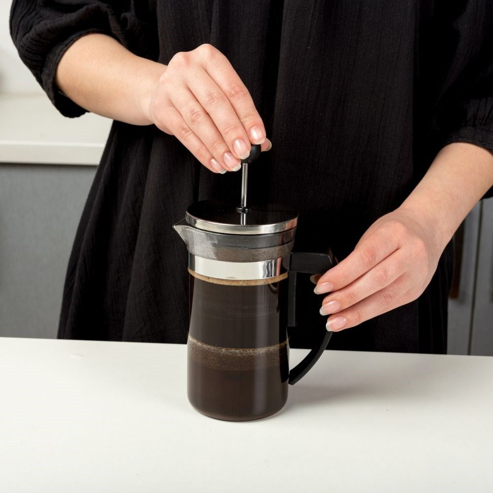 Coffee press in heat-resistant glass with steel piston