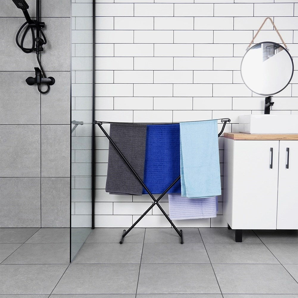 Collapsible, weatherproof drying rack for laundry