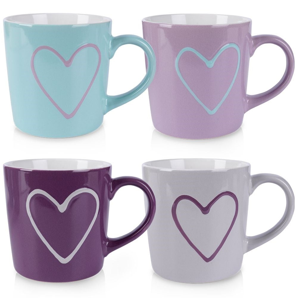 Colorful ceramic cups with heart motifs and comfortable handles