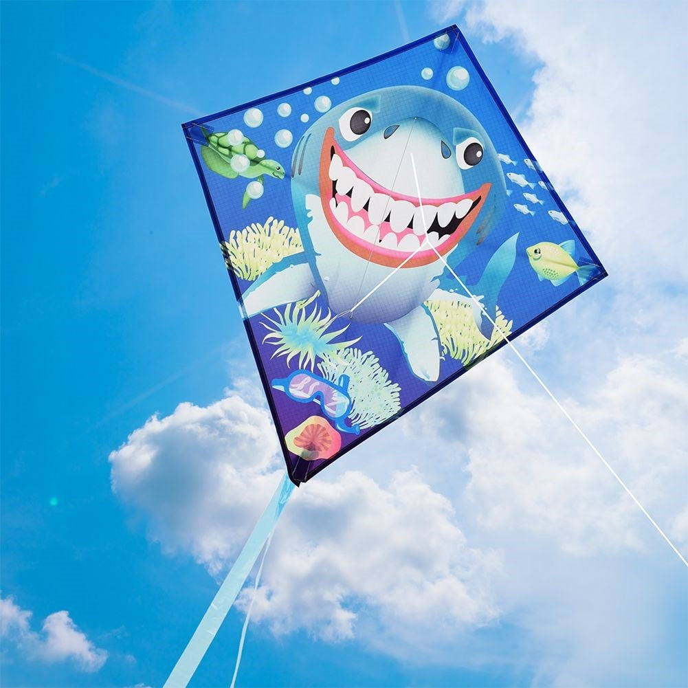 Colorful kite with shark motif and 36 meters of line