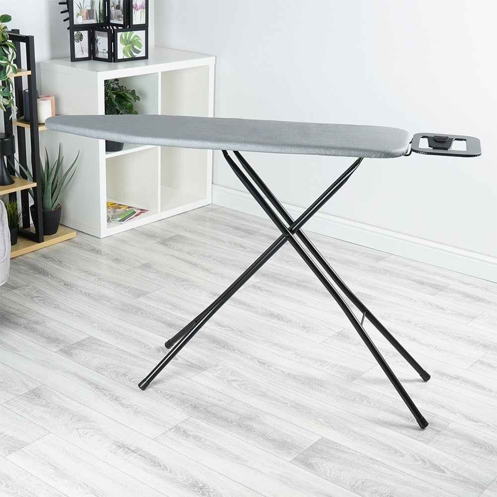 Comfortable and stable ironing board with iron holder