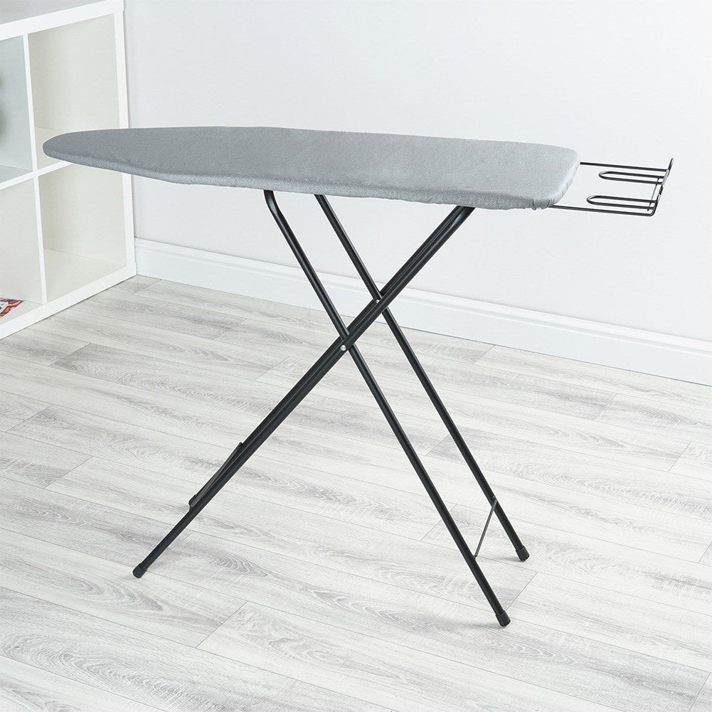 Comfortable, stable ironing board with iron holder