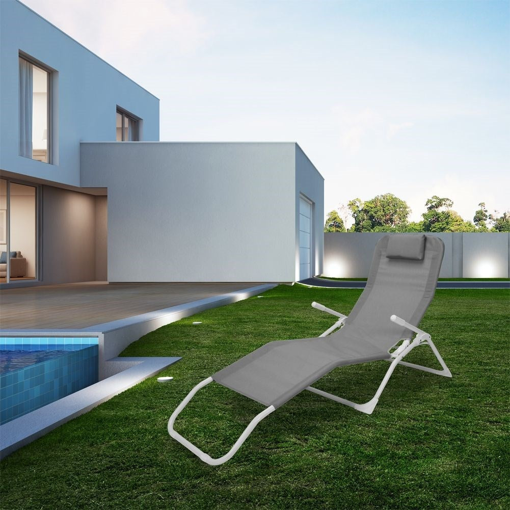 Comfortable sun lounger with gravity function in grey-white colour