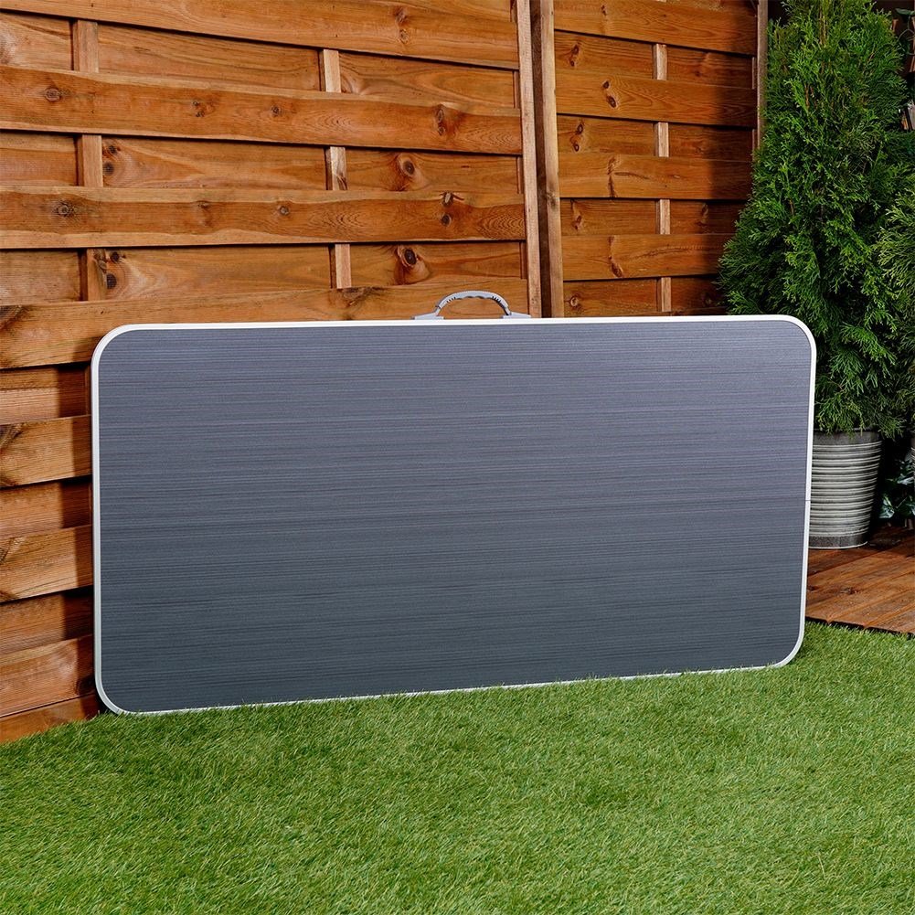 Compact and weatherproof camping table with metal legs