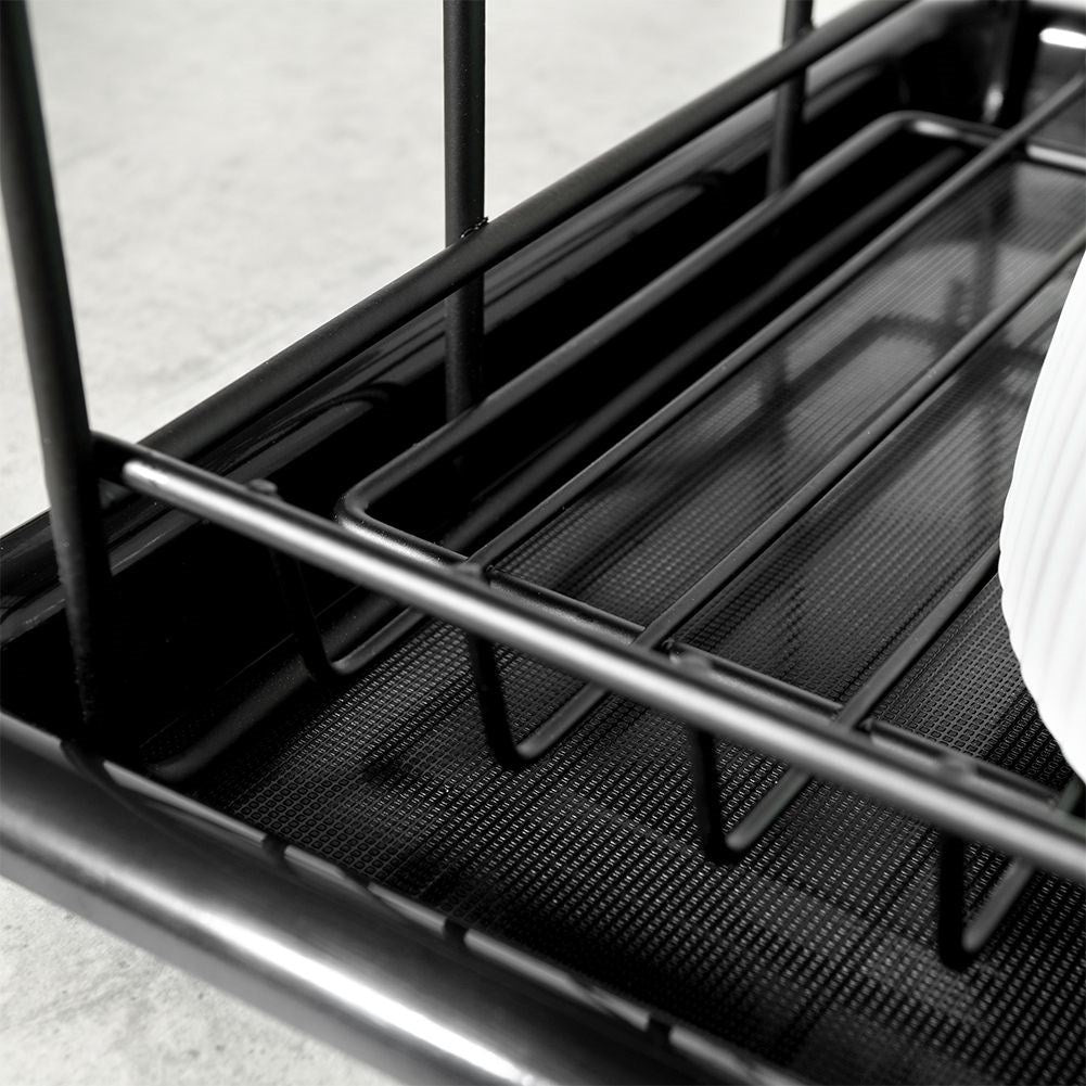 Compact two-tier black dish rack with draining tray