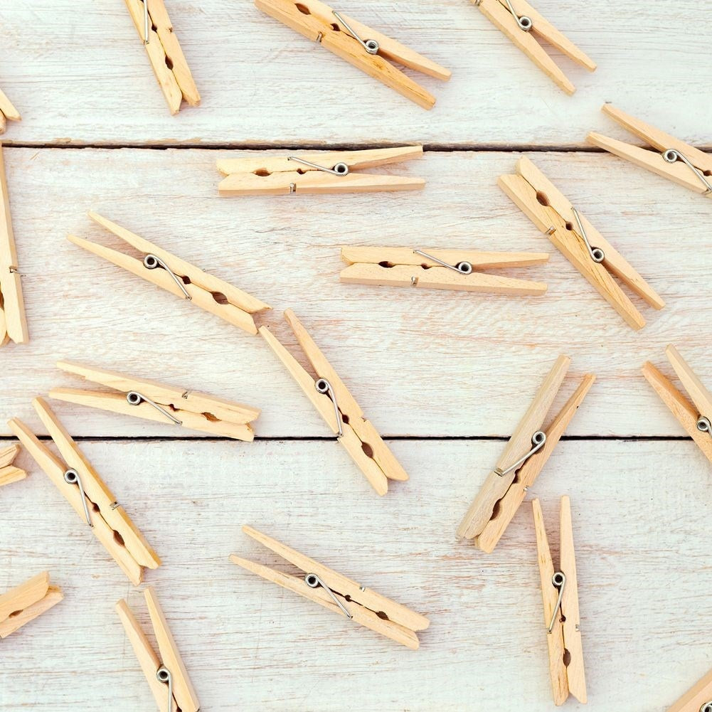 Complete set of 24 strong wooden clothespins for indoor and outdoor use