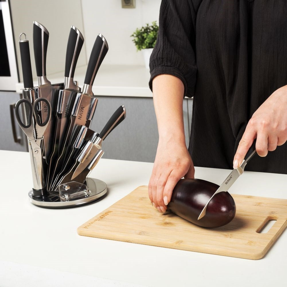 Comprehensive kitchen knife set with knives, meat axe, scissors and sharpener