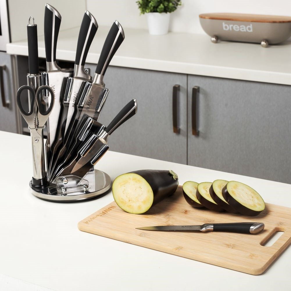 Comprehensive kitchen knife set with knives, meat axe, scissors and sharpener