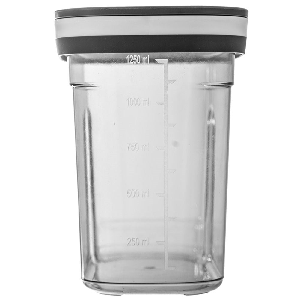 Container with dosing lid and measuring scale for dry goods