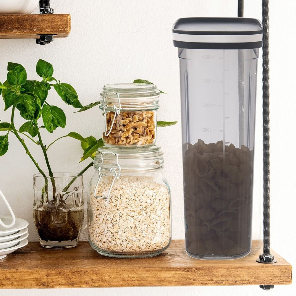 Container with dosing lid for dry goods, incl. measure
