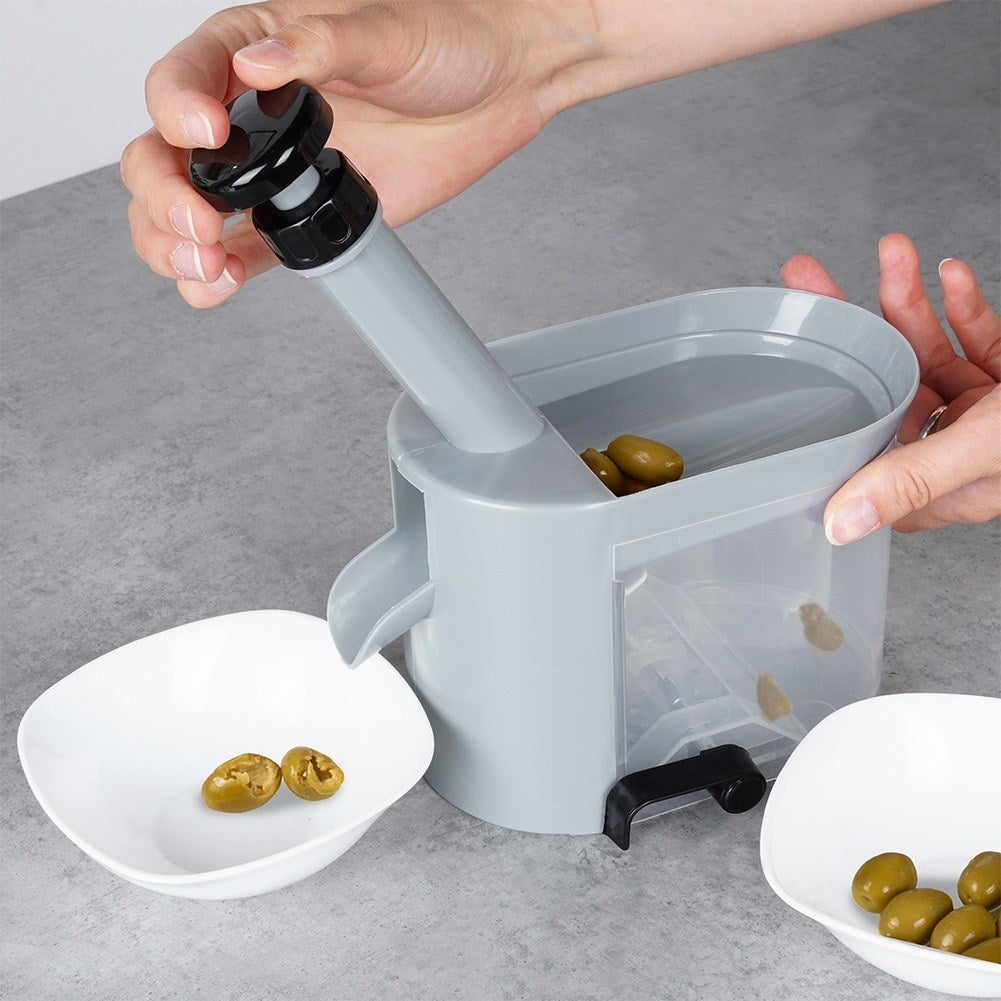 Core cherries and olives quickly with a suction cup corer